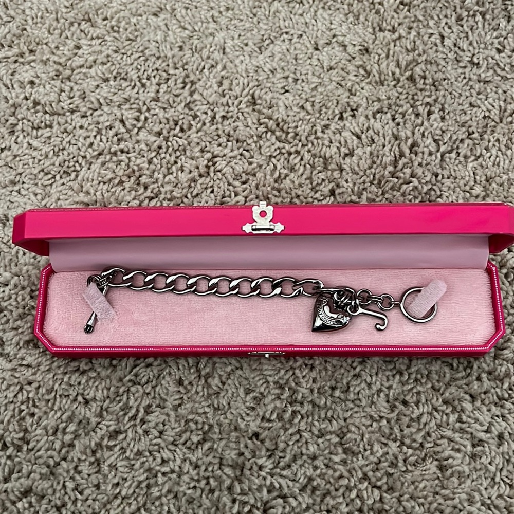 Barely worn, well kept, Juicy Couture silver bracelet